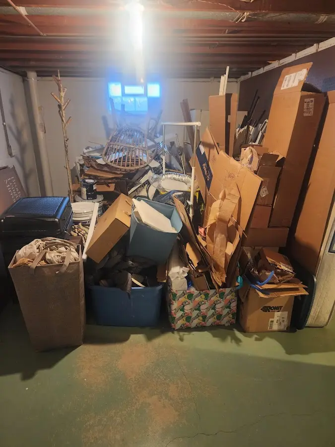 Roll-off dumpster container at job site for 6 Yard Dumpster Rental in Homer